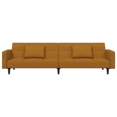 Sofá modular mostarda com almofadas e pernas pretas em fundo branco