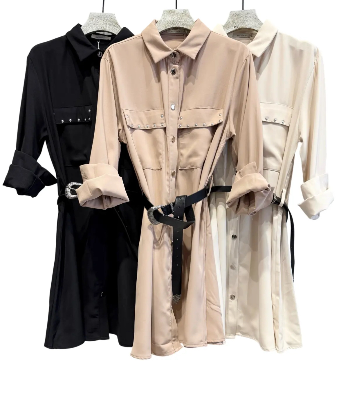 Vestidos camisa em preto, bege e creme com bolsos, rebites e cinto preto.