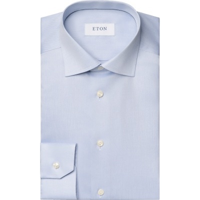 Camisa azul claro ETON dobrada com botões brancos