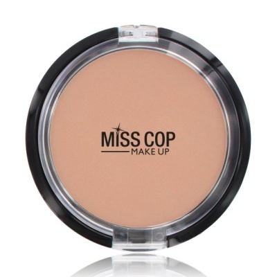 Pó compacto MISS COP MAKE UP em embalagem redonda preta com tampa transparente