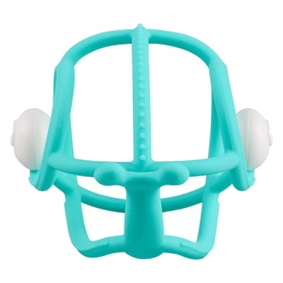 Máscara facial de silicone azul turquesa com ventosas brancas.