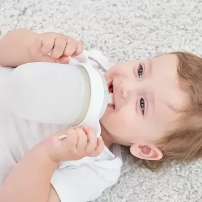 Biberão com pegas e bola de gravidade (+6m), rosa (PPSU), 300ml