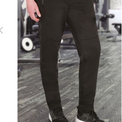 Calças de treino com efeito térmico 95% poliester 5% elastano  320 Grs.