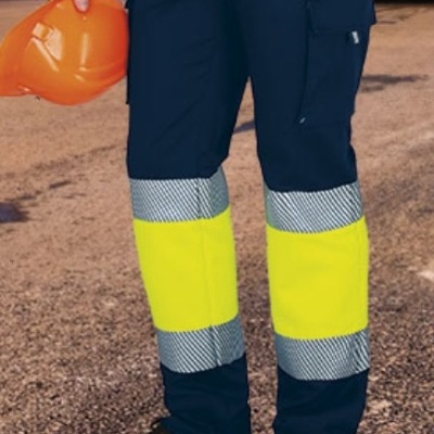 Calças multibolsos elásticas de alta visibilidade com desenho bicolor 60% Poliester 35% algodão 5% elastano