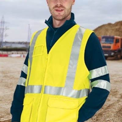 Colete refletor leve com bolsos 155Grs. 100% Poliester