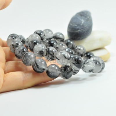 Pulseira de Quartzo Hialino com Turmalina Negra Pulseira de Quartzo Hialino com Turmalina Negra