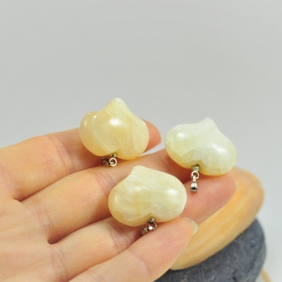 Pendente coração de Calcita Amarela Pendente coração de Calcita Amarela