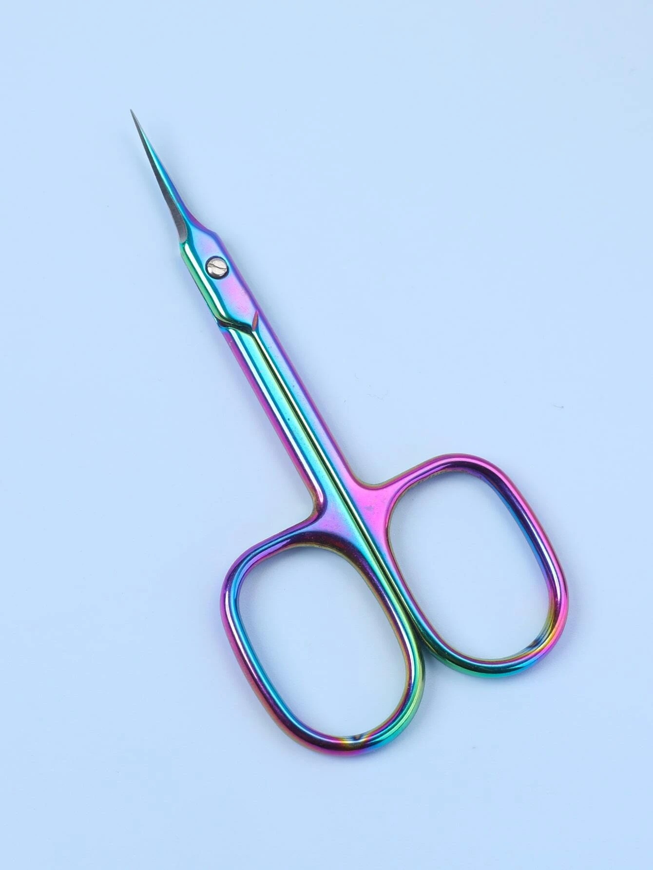 Tesoura metálica pequena colorida em tons iridescentes