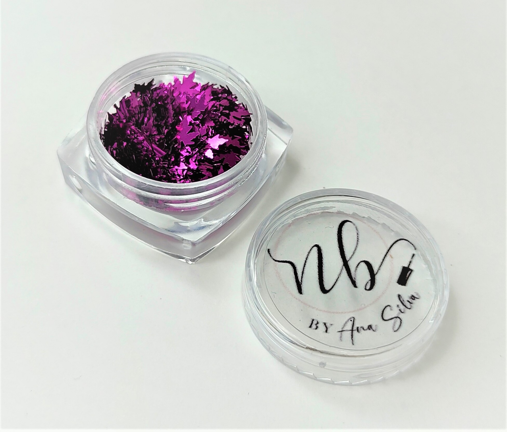 Pote transparente com glitter roxo e tampa com texto modesto