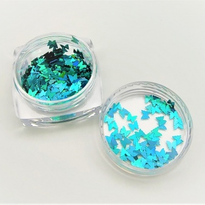 Frascos com lantejoulas de borboleta azuis e verdes