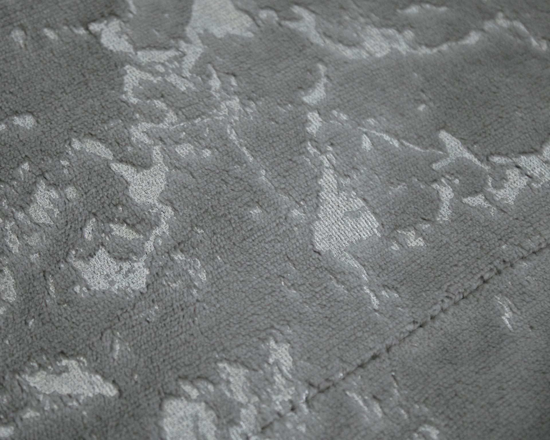 tecido cinzento com padrão texturizado
