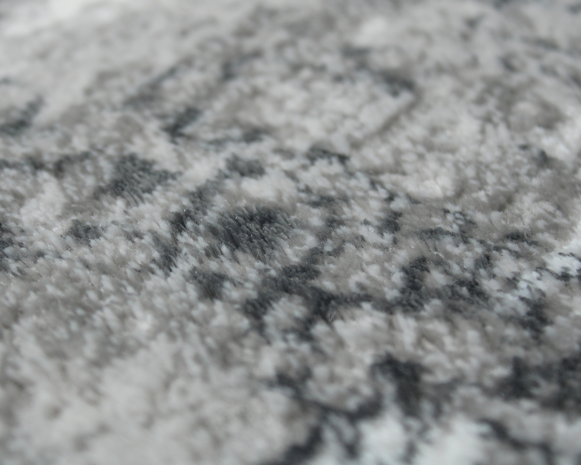 Tapete com padrão abstrato em tons de cinza