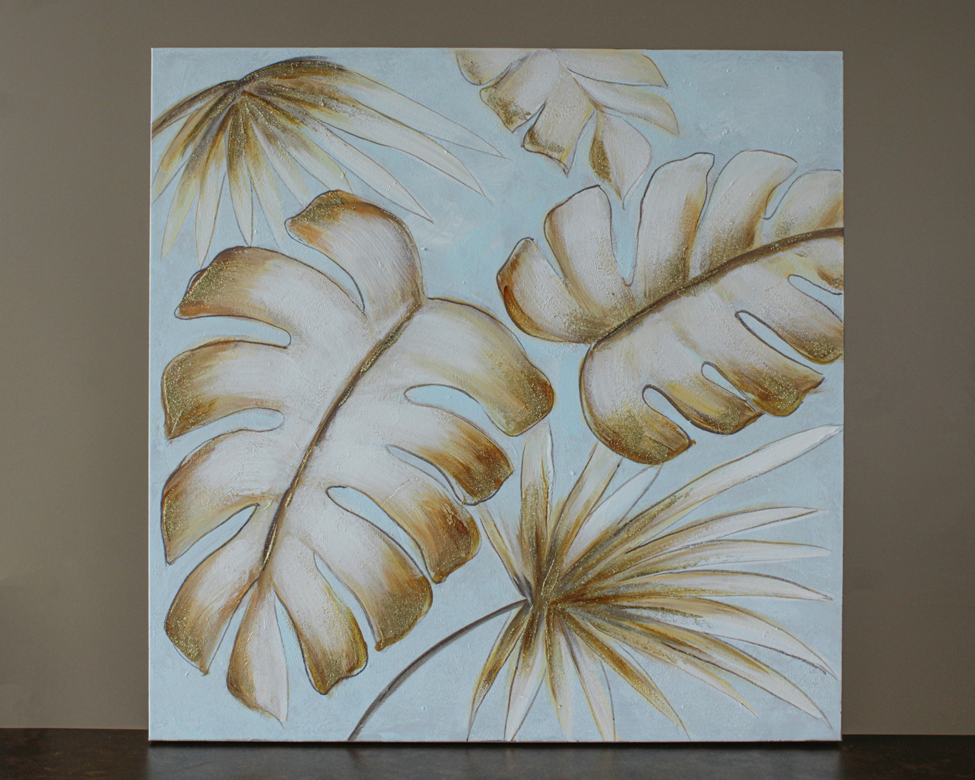 Tela azul com folhas tropicais