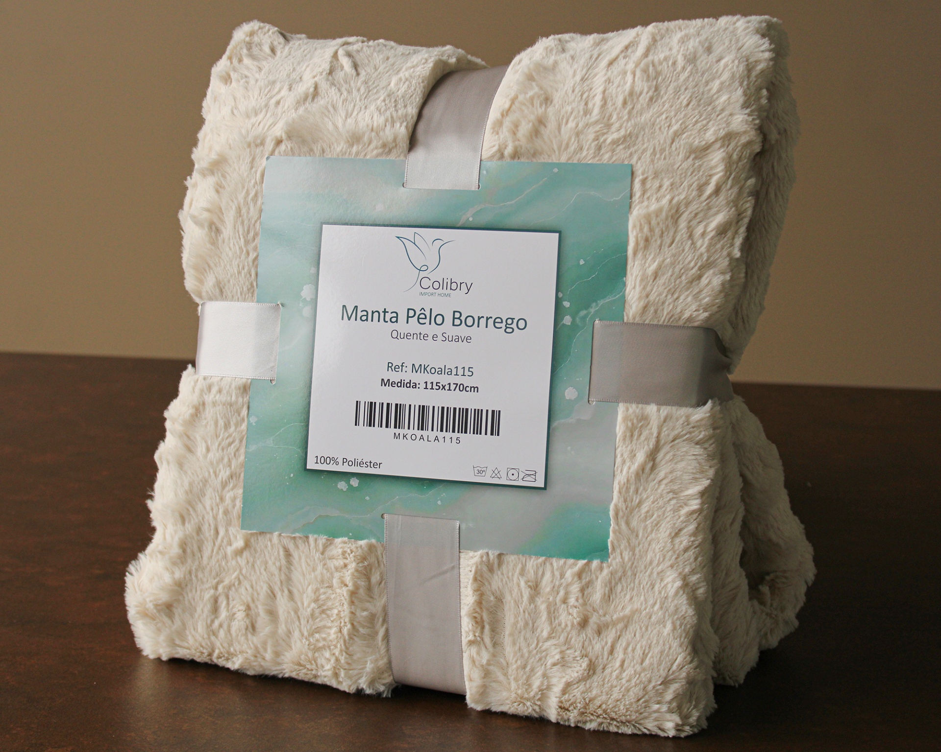 Manta Pêlo Borrego bege claro com etiqueta de embalagem