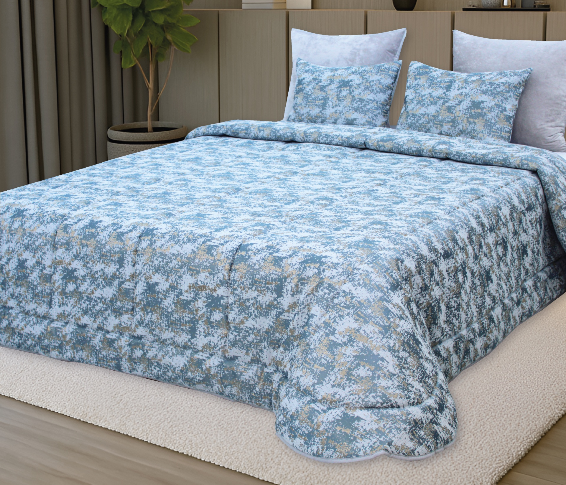 Conjunto de cama com edredão e almofadas padrão azul e bege numa divisão moderna