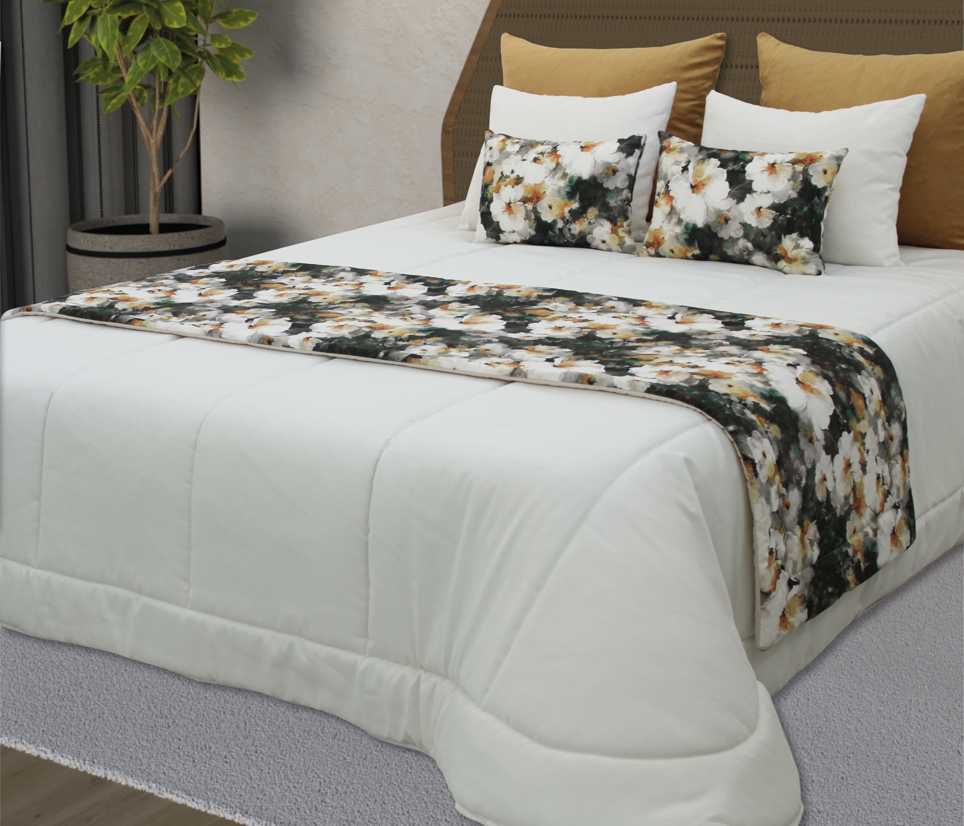 Cama com edredão branco e detalhes florais em almofadas e passadeira