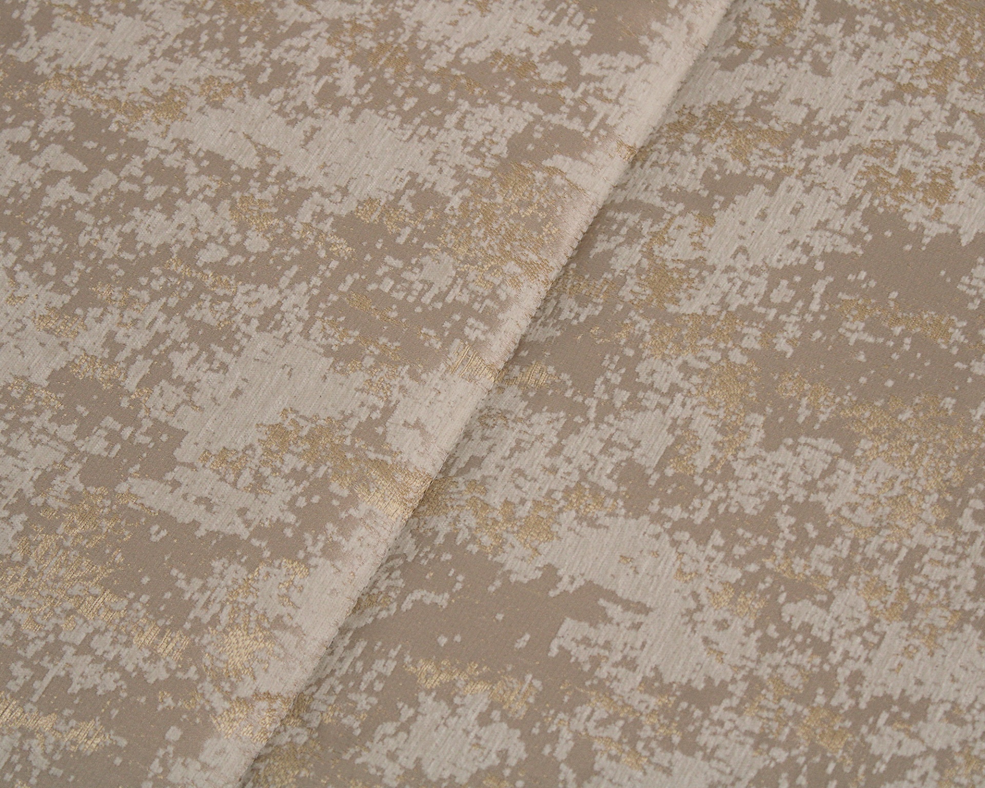 Tecido decorativo bege e dourado com padrão texturizado