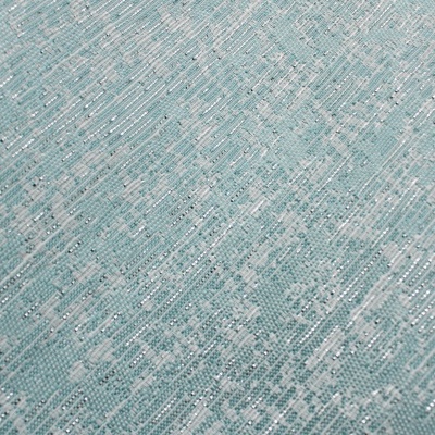 tecido azul claro com padrão geométrico e detalhes em brilho prateado