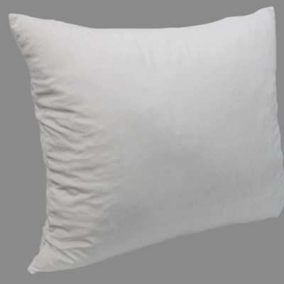 Travesseiro branco retangular sobre fundo cinzento