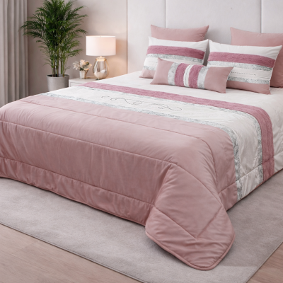 Conjunto de cama rosa, branco e cinzento com almofadas e edredão em quarto moderno