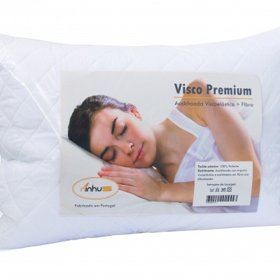 Travesseiro Visco Premium branco embalado com rótulo com imagem de mulher a dormir