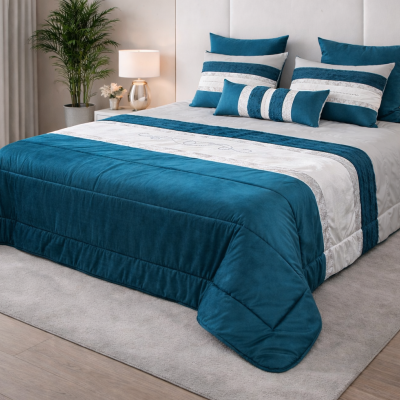 Cama com edredão azul petróleo e branco decorativo