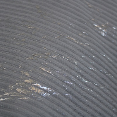 Textura cinzenta ondulada com marcas brilhantes