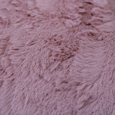 Superfície cor-de-rosa macia e peluda com textura uniforme