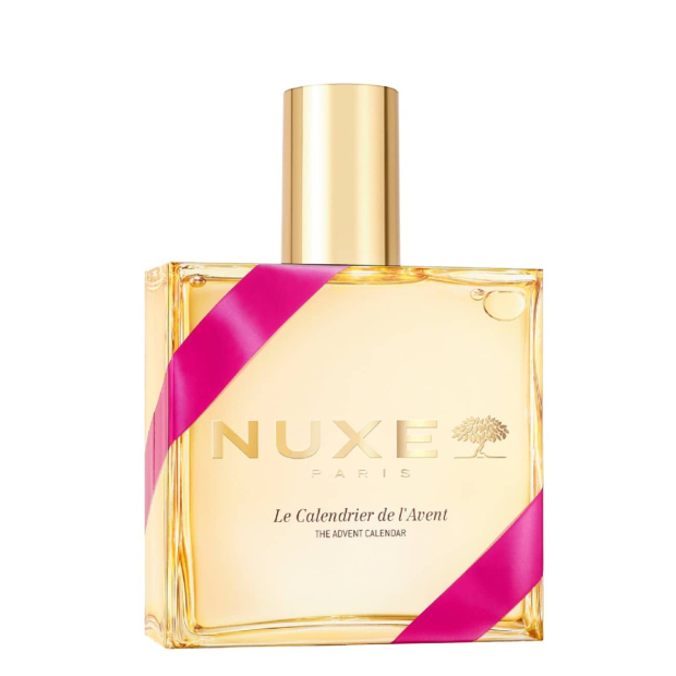 Nuxe - Coffret Calendário do Advento Frasco de perfume NUXE PARIS com fita rosa e tampa dourada em fundo branco