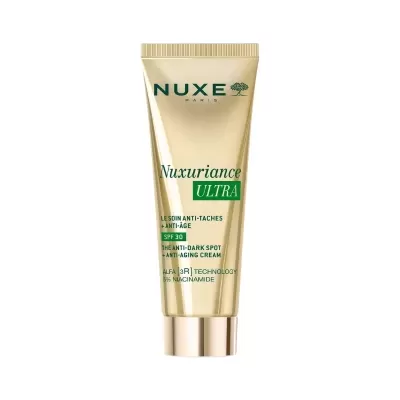Creme facial Nuxe Nuxuriance Ultra em tubo dourado com texto verde em fundo branco
