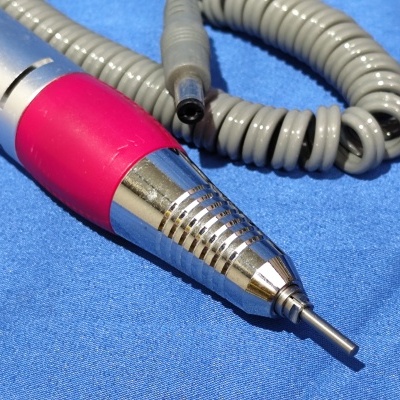 Peça de mão para broca portátil