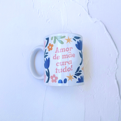 Caneca "Amor de Mãe cura tudo" 