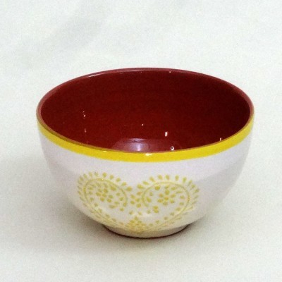Taça de cerâmica com decoração amarela e interior vermelho