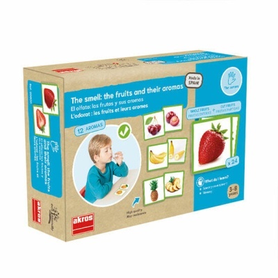 Caixa de jogo educativo com imagem de várias frutas e um menino cheirando algo.