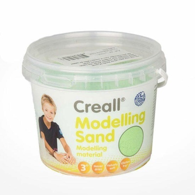 Baldecote de areia modeladora verde claro com rótulo Creall Modelling Sand.