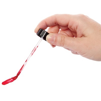 Garrafas de tinta e cola com pincel