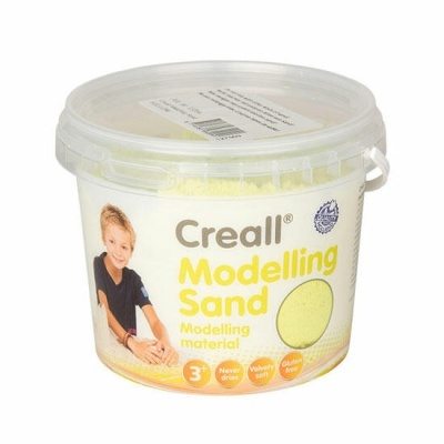Embalagem de areia modelável amarela Creall com imagem de criança na etiqueta