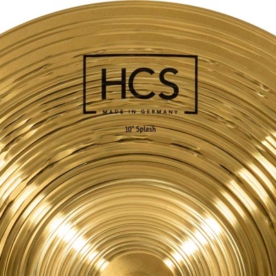 Prato musical dourado com texto 'HCS MADE IN GERMANY 10