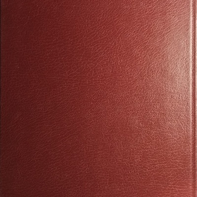 Livro capa dura vermelha com textura fina tipo pele