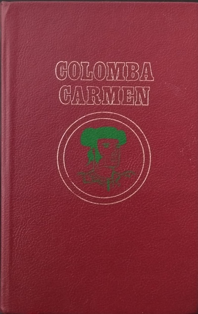 Livro com capa vermelha e texto COLOMBA CARMEN em relevo