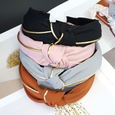 Tiaras de tecido em quatro cores com nó e detalhe dourado