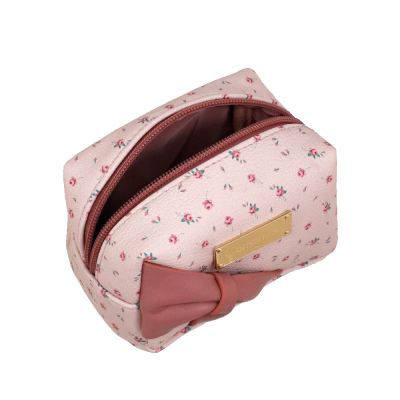 Necessaire creme com padrão floral rosa e laço cor-de-rosa