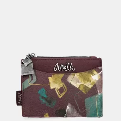 Carteira roxa com estampas abstratas e logo Anekke em metal