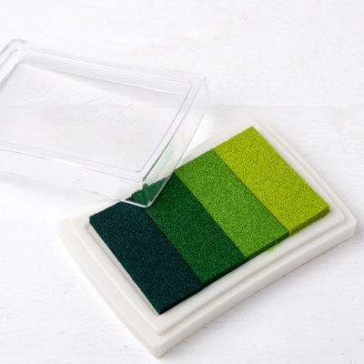 Almofada de tons tinta verde