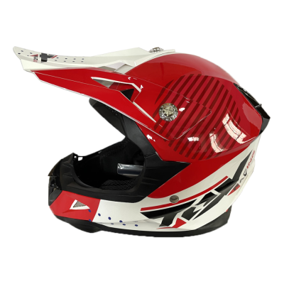 Capacete de motocross vermelho e branco com visor e texto 'TEXX RACING'