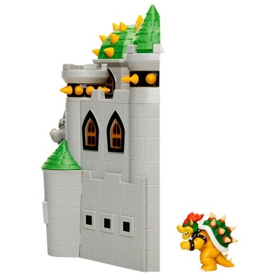 Figurina Bowser com castelo cinzento de peças plásticas com telhados verdes