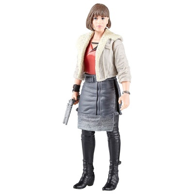 Boneca articulada com casaco bege e saia preta, segurando arma.