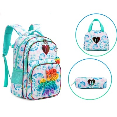 Mochila, saco de mão e estojo escolares com padrão colorido e unicórnio pop it.