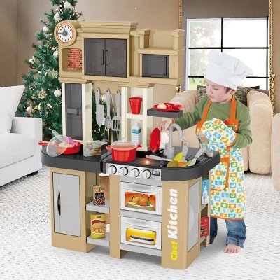Cozinha de brincar infantil com acessórios, texto Chef Kitchen, em sala decorada para Natal