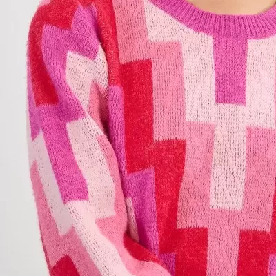 Camisola de malha rosa, vermelha e lilás com padrão geométrico